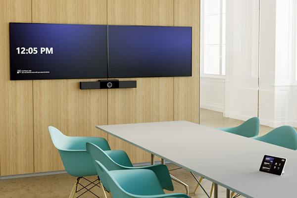 A corporate conference room setup with new video conference systems from Data Projections