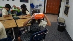 A female St. Mark student enjoying VR on the ClassVR standalone headset