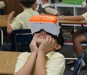 A young student in awe of VR with the ClassVR standalone headset